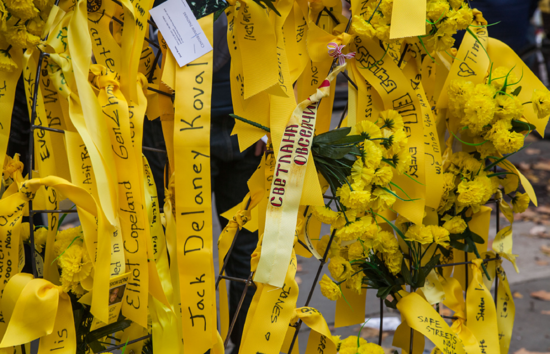 Yellow ribbons with names of traffic crash victims