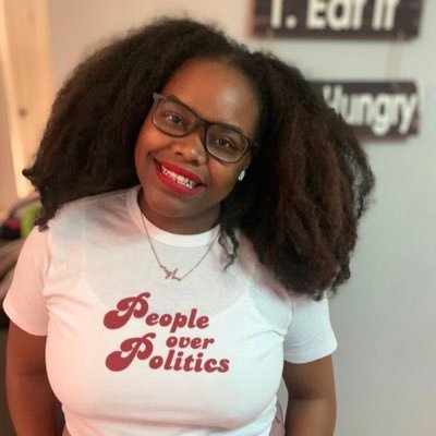 Shontel Lewis wearing shirt that says People Over Politics