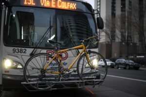 Photo of a Denver bus with a bike on the front rack