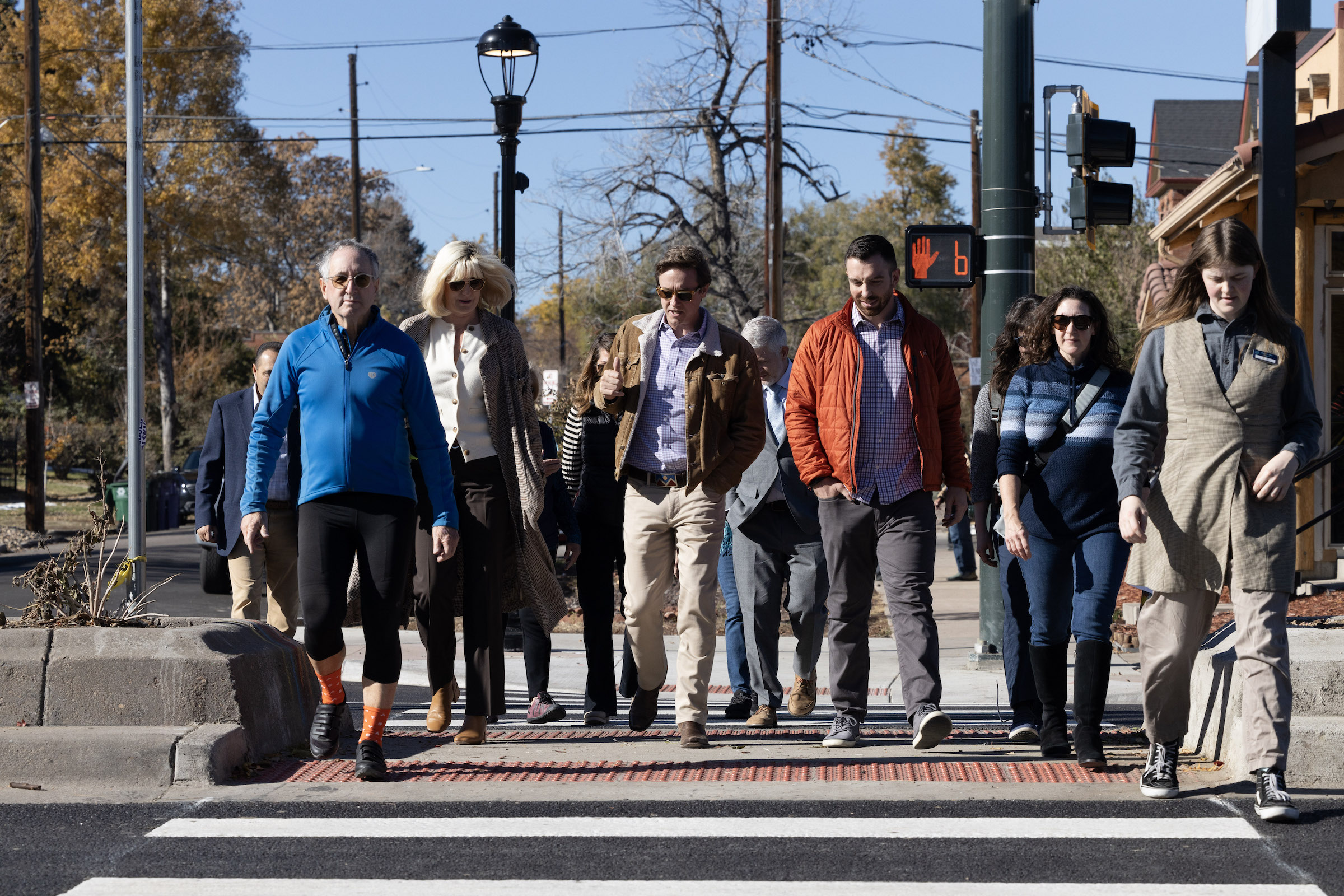 Image of people walking in a crosswalk